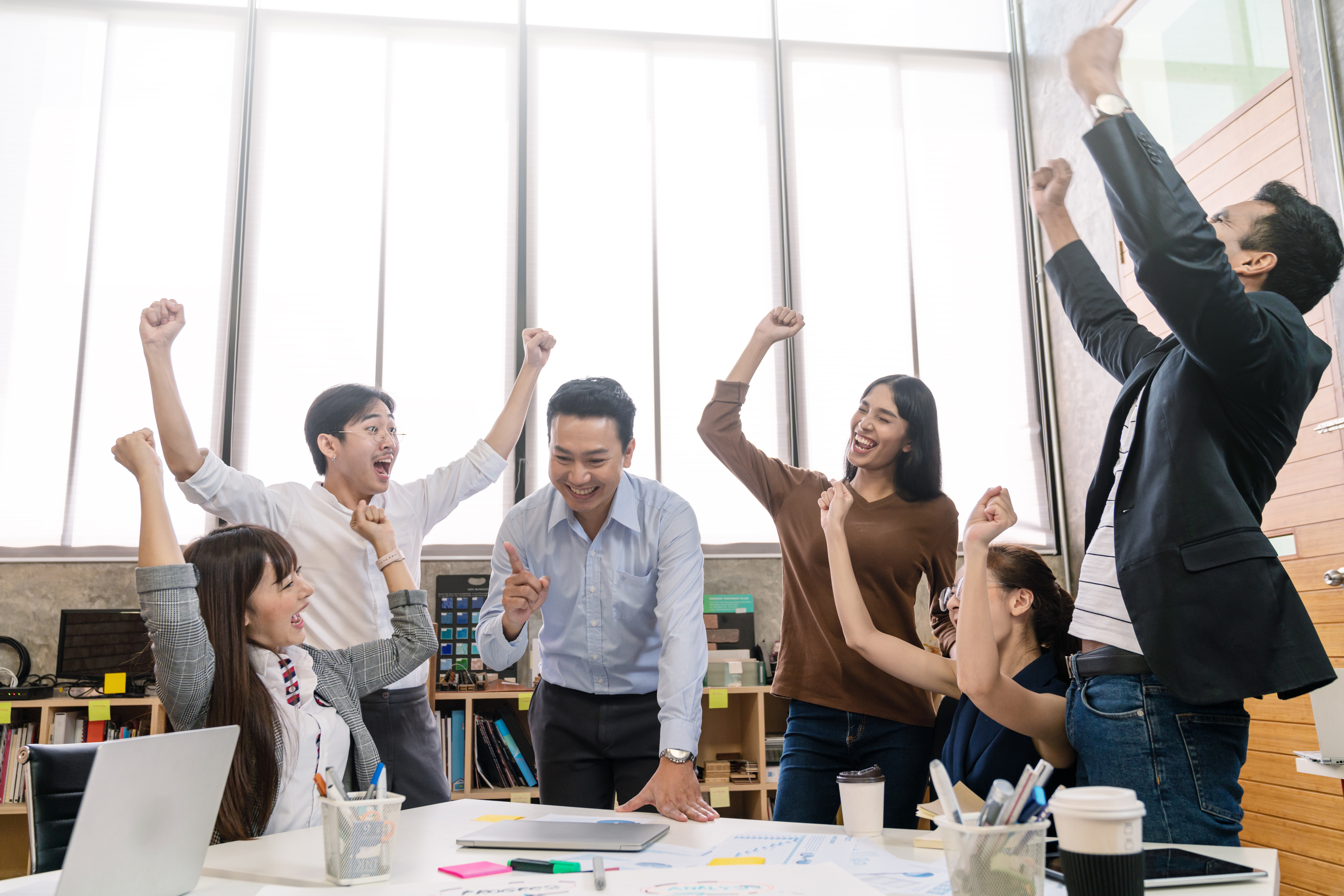 happy employees with excellent company culture